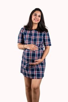 Chicmomz-A blue check, fitted, folded-short sleeve maternity dress and with a rounded neckline.
