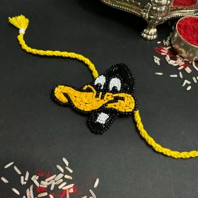 Bobtail-DAFFY DOODLE (DAFFY DUCK RAKHI + BROOCH)
