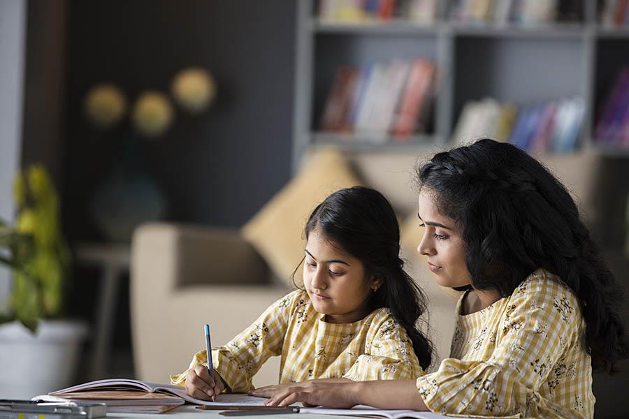 Child and Mother in Home Schooling