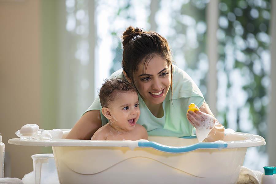 Bathing Baby and Mother joy