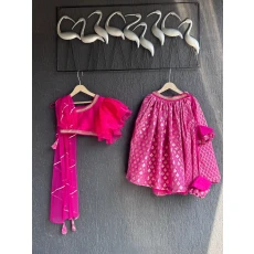 One off shoulder blouse with attached dupatta and chanderi Lehnga